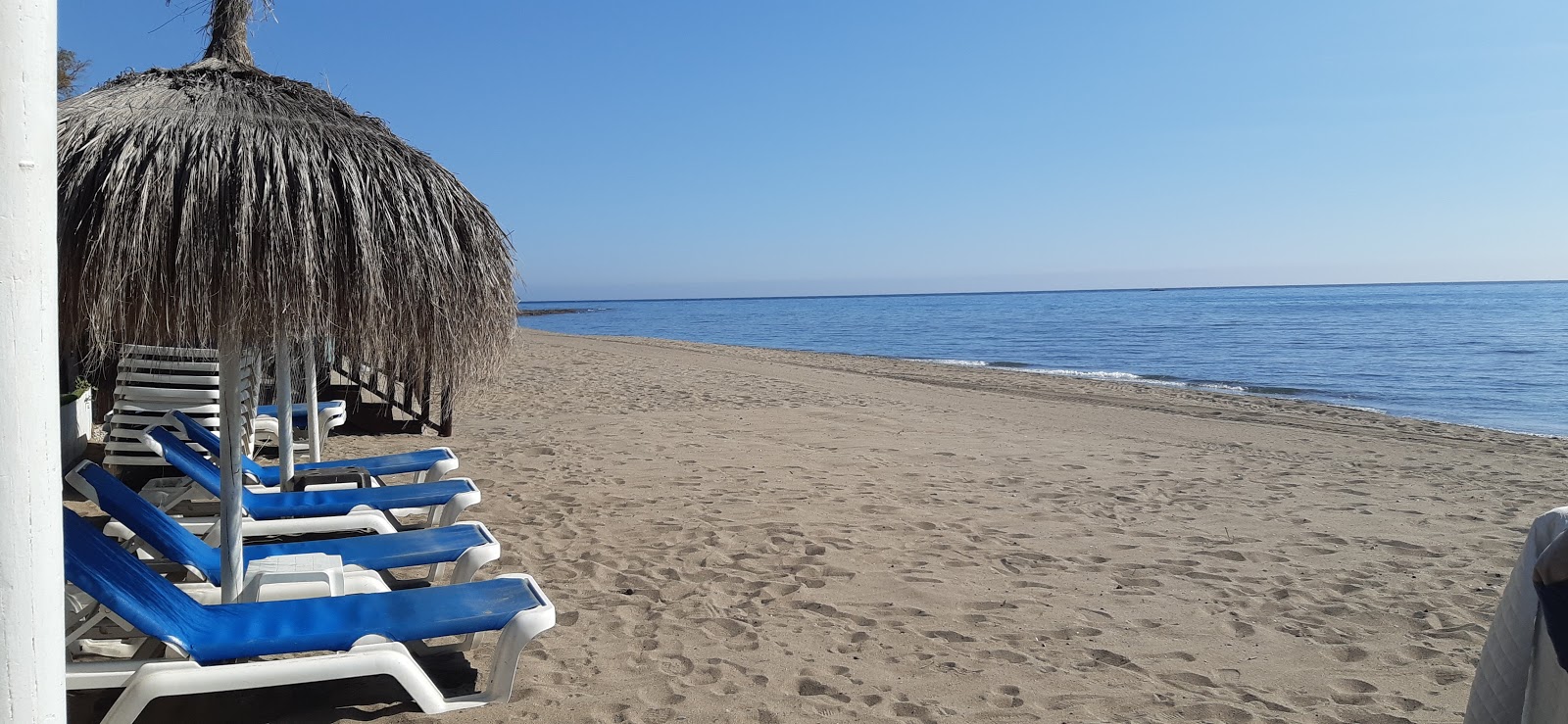 Foto av Torre Ancon beach med grå sand yta