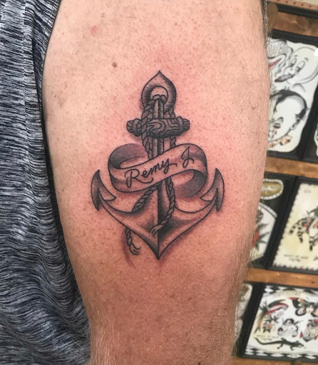 Explore mens behind ear tattoo ideas, creative tattoo ideas in Campbellsville, available at Green River Tattoo Company