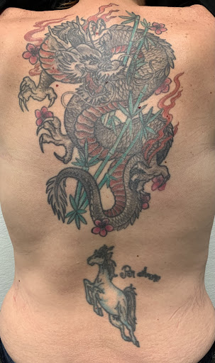 Explore pink ribbon tattoo ideas, creative tattoo ideas in Conroe, available at Monsters Ink, LLC