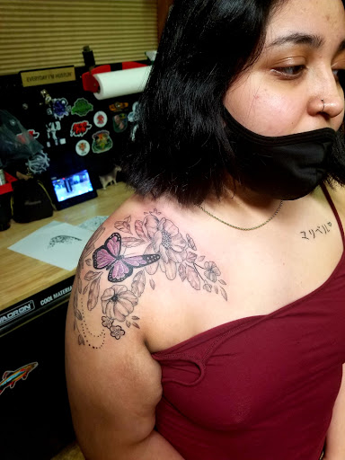 Explore red tattoo ideas, creative tattoo ideas in Conway, available at Primal Urge Tattoos