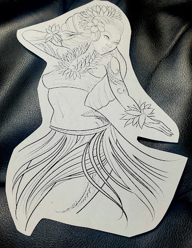 Explore joker hand tattoo ideas, creative tattoo ideas in Honolulu, available at Sacred Art Tattoo Waikiki