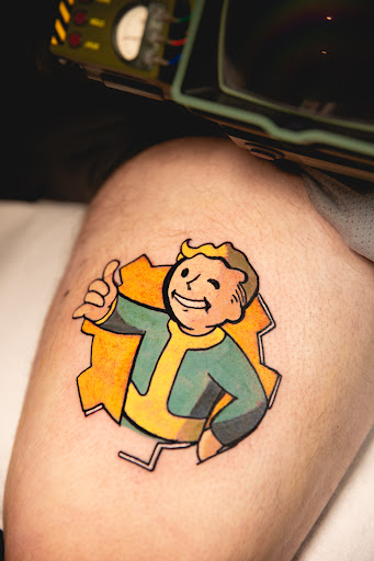 Explore calf muscle tattoo ideas, creative tattoo ideas in Seaside, available at Sacred 8 Studios