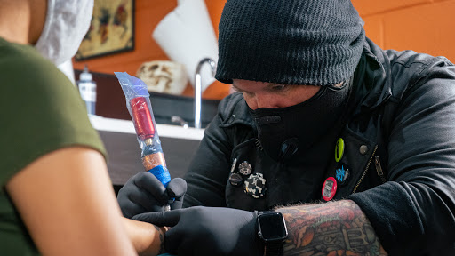Explore barcode tattoo ideas, creative tattoo ideas in Virginia Beach, available at World Famous Blue Horseshoe Tattoo and Piercing Independence