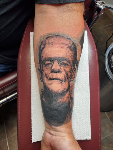 Explore city tattoo ideas, creative tattoo ideas in Fort Gratiot, available at Stained Glass Tattoo & Body Piercing