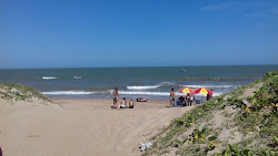 Foto von Sossego Strand und die siedlung