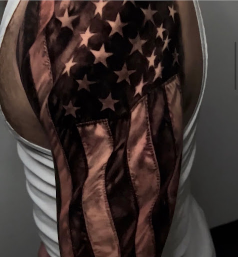 Explore scissor tattoo ideas, creative tattoo ideas in Fort Wayne, available at Grade A Tattoos and Body Piercing