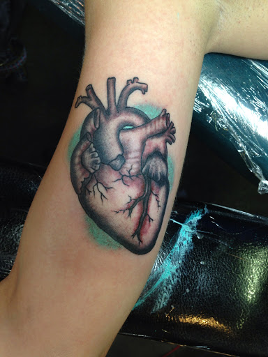 Explore fighter tattoo ideas, creative tattoo ideas in Reno, available at Aces Tattoo