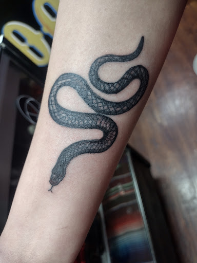 Explore dragon tattoo ideas forearm, creative tattoo ideas in San Antonio, available at Master Minds Tattoo