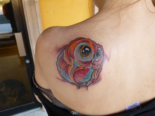 Tattoo Shop «magnum opus tattoo company», reviews and photos, 1817 Padre Blvd #4, South Padre Island, TX 78597, USA