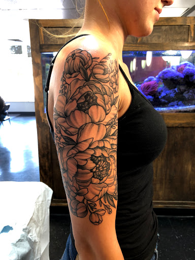 Find dog tattoo idea for your next unique tattoo in Kennewick at Gravity Tattoo