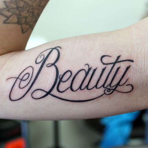 Explore sleeve tattoo filler ideas, creative tattoo ideas in Fort Myers, available at Tiger Lotus Tattoo and Piercing