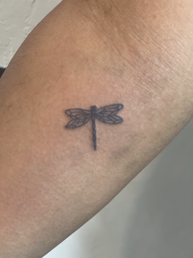 Explore green arrow tattoo ideas, creative tattoo ideas in Avon, available at Avanti Tattoo