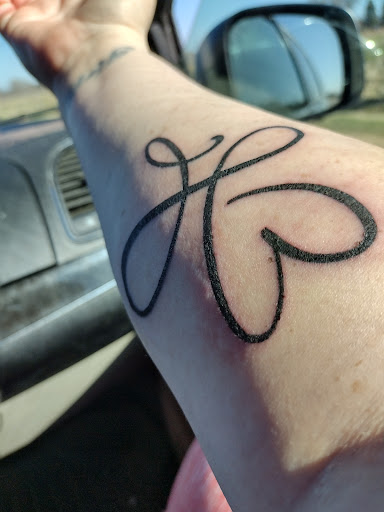 Explore dog tattoos ideas, creative tattoo ideas in Wisconsin Dells, available at Twisted Dimensions Tattoo Studio