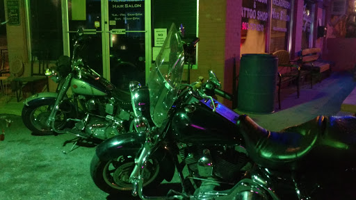 Explore rib tattoo ideas for women, creative tattoo ideas in Longview, available at Fugis Tattoo Shop