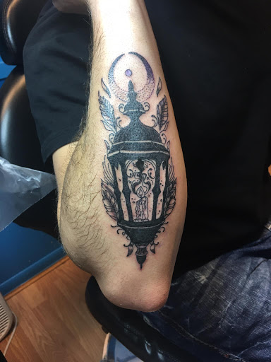 Explore fallen angel tattoo ideas, creative tattoo ideas in Jonesboro, available at Immortal Ink