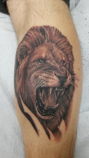 Tattoo Shop «Rise Above Tattoo», reviews and photos, 1009 N Mills Ave, Orlando, FL 32803, USA