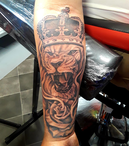 Explore gunslinger tattoo ideas, creative tattoo ideas in Abilene, available at A Tattoo Experience by Spaz