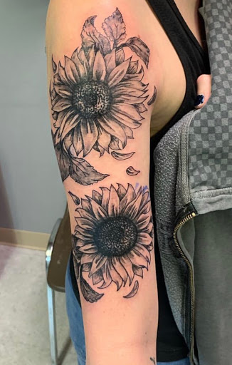 Explore badass female tattoo ideas, creative tattoo ideas in Hudson Falls, available at ALTERED ADDICTION TATTOOS