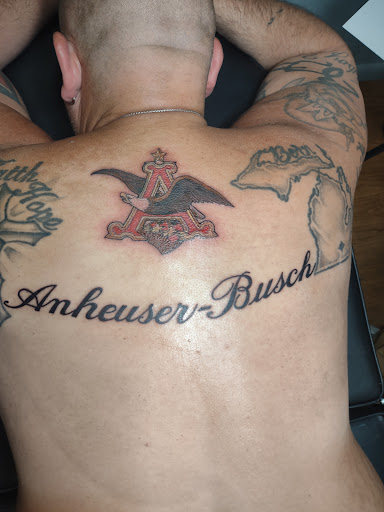 Explore tattoo ideas for mothers with sons, creative tattoo ideas in Williamston, available at Inkd Tattoo Parlor