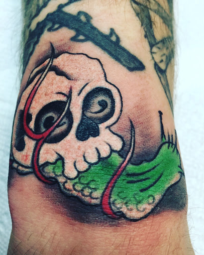 Explore tattoo ideas for sons, creative tattoo ideas in Frisco, available at Frisco Tattoo Company - Steel PaintBrush