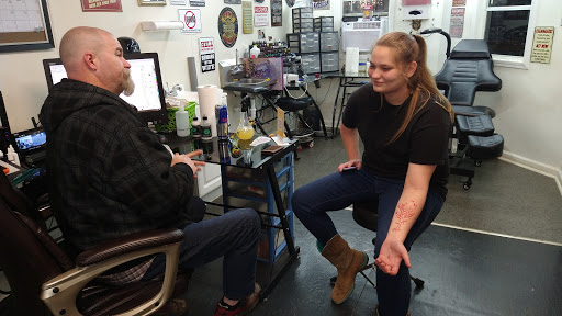 Explore cover up tattoo ideas male arm, creative tattoo ideas in Abbeville, available at Permanent Decisions