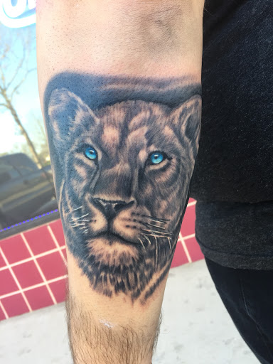 Explore tattoo ideas for guys shoulder, creative tattoo ideas in Jacksonville, available at Electric Legacy Tattoo