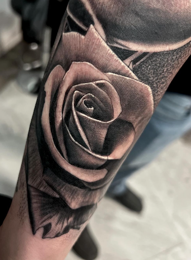 Explore sunflower arm tattoo ideas, creative tattoo ideas in Ogden, available at Savage Tattoo Shop