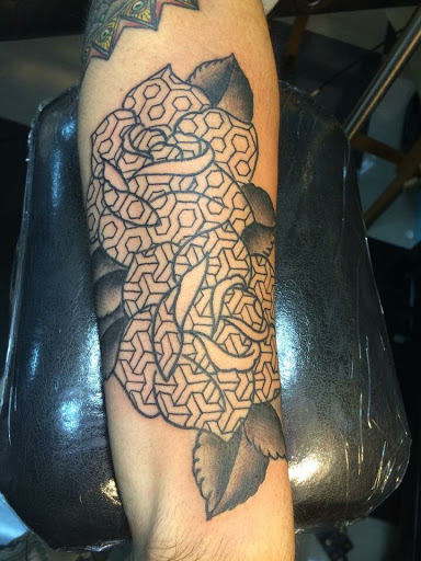 Explore undertaker tattoo ideas, creative tattoo ideas in Saint Augustine, available at Ms. Deborahs Fountain of Youth Tattoo & Body Piercing