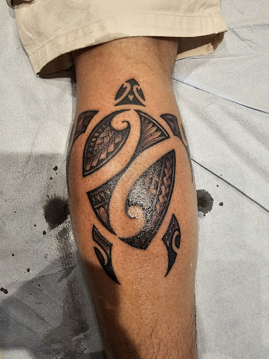Explore tattoo ideas for men's back, creative tattoo ideas in Honolulu, available at Aloha Tattoo Waikiki Hilton Hawaiian Village Rainbow Bazaar