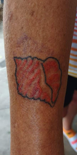 Explore hook tattoo ideas, creative tattoo ideas in Myrtle Beach, available at Pitbull Tattoo and Piercing Clinic