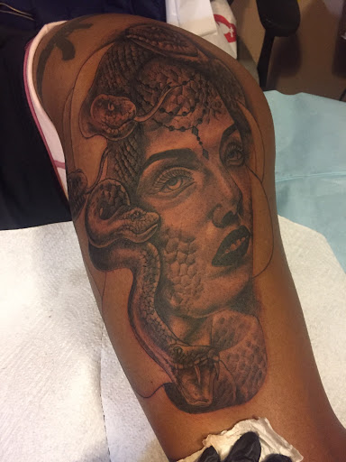 Explore animal skull tattoo ideas, creative tattoo ideas in Atlanta, available at Camp Creek Body Art & Laser