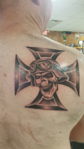 Explore tattoo scroll ideas, creative tattoo ideas in Santa Fe, available at The G Spot (I.P.Ink)