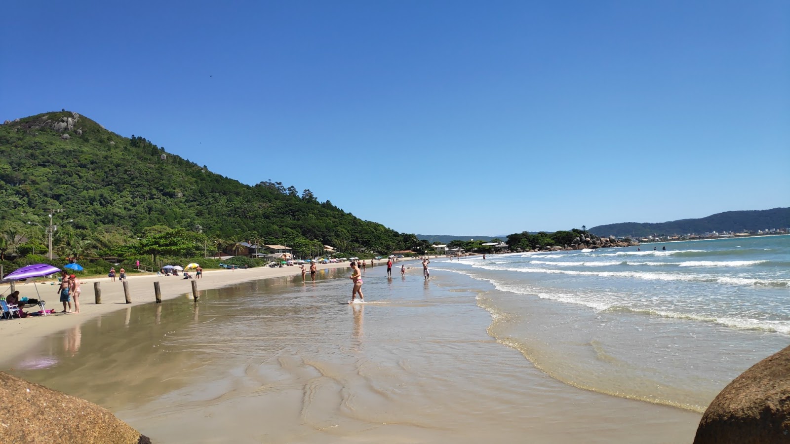 Photo of Conceição Beach with turquoise pure water surface