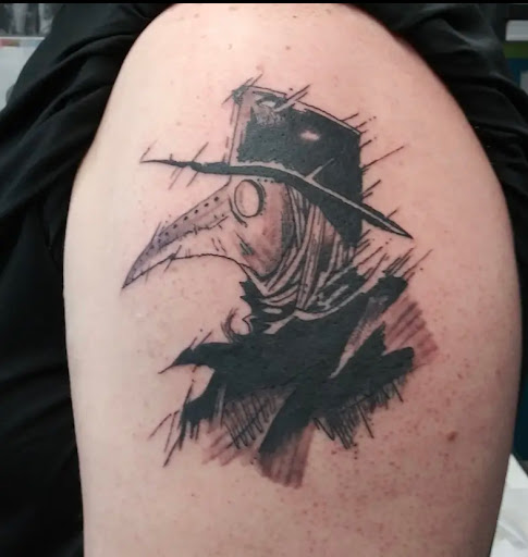 Explore mens chest tattoo ideas, creative tattoo ideas in Franklin, available at Broadway Ink Tattoos and Piercings