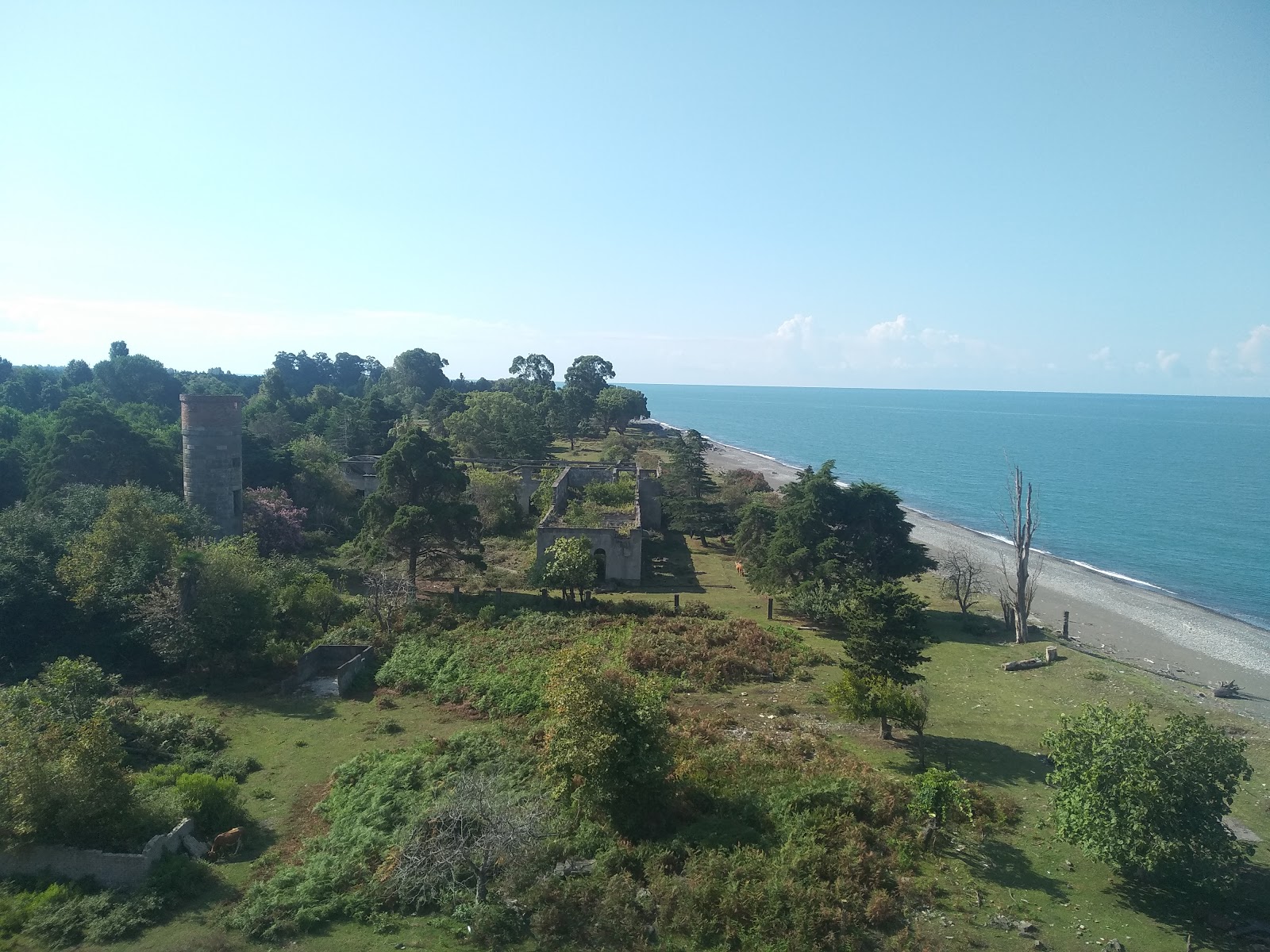 Foto di Varcha beach con una superficie del ciottoli beige