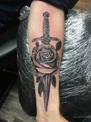 Explore wrist tattoo ideas for females, creative tattoo ideas in Warner Robins, available at Untold Pain Tattoo Studio