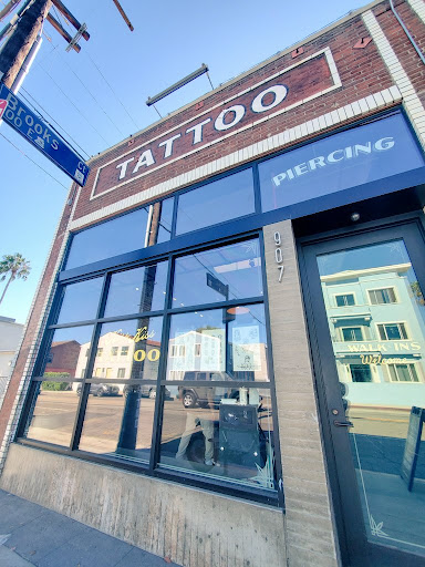 Explore thigh tattoo ideas woman, creative tattoo ideas in Venice, available at KISS KISS TATTOO & PIERCING