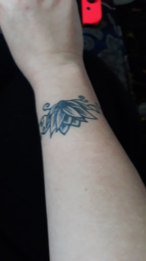 Explore world traveler tattoo ideas, creative tattoo ideas in Kansas City, available at Divine Tattoo Parlor