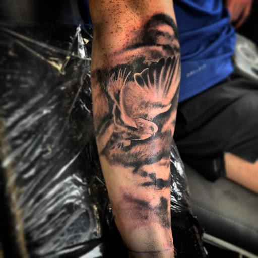 Explore tattoo ideas for names on wrist, creative tattoo ideas in Medina, available at Greasers Ink