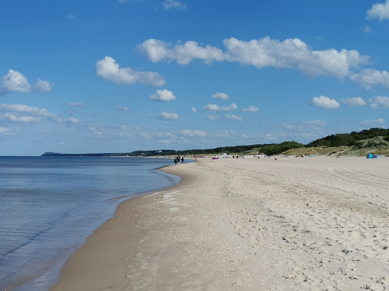 Fotografie cu Trassenheide strand cu o suprafață de nisip strălucitor