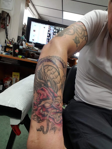 Find beach wave tattoo ideas for your next unique tattoo in Lancaster at Transcending Flesh