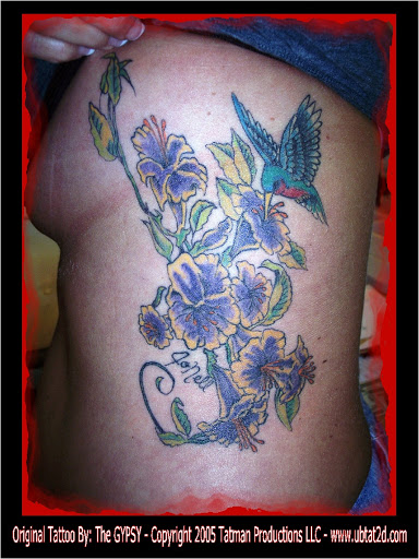 Explore lower belly tattoo ideas, creative tattoo ideas in Topeka, available at Artist Alley Studio Tattoos & Piercings