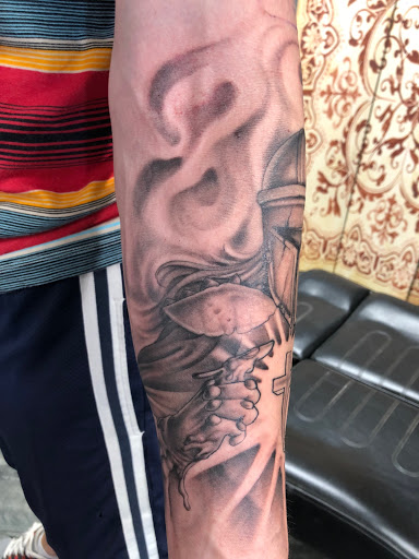 Explore unique knee tattoo ideas, creative tattoo ideas in Des Moines, available at Skin Kitchen Tattoo