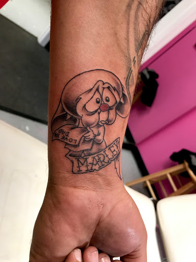 Explore song lyric tattoo ideas, creative tattoo ideas in Brunswick, available at Blue Fin Tattoos