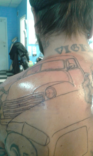 Tattoo Shop «InkSylum Tattoo», reviews and photos, 1726 S Chambers Rd, Aurora, CO 80017, USA