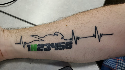 Tattoo Shop «The Iron Inkwell Custom Tattoos & Piercings», reviews and photos, 1901 N Monroe St Suite D, Tallahassee, FL 32303, USA