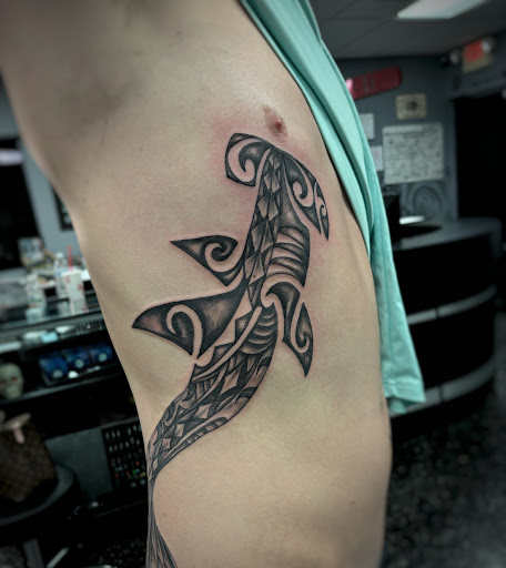 Explore wednesday tattoo ideas, creative tattoo ideas in Fort Myers, available at Loyal 2 The Coil Tattoos & Piercings (Edison Mall Location Entrance F)