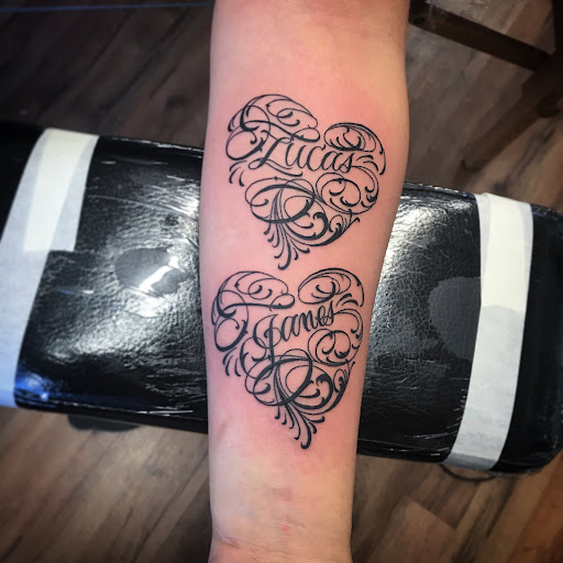 Explore tattoo scroll ideas, creative tattoo ideas in Madera, available at Sea Wolf Tattoo
