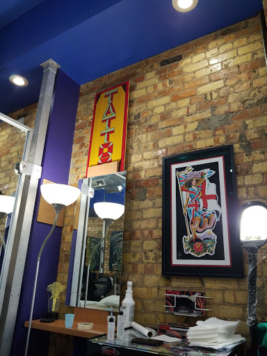 Tattoo Shop «Eclectic Art Tattoo Gallery», reviews and photos, 615 E Michigan Ave, Lansing, MI 48912, USA