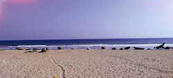 Φωτογραφία του KR Peta Beach με μακρά ευθεία ακτή